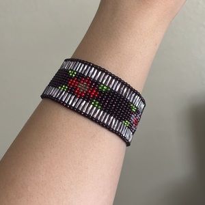 Bracelet handmade with beads purple red green